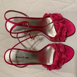 bebe fuchsia, satin, lace dress heels.  Strapping goes around your ankle.